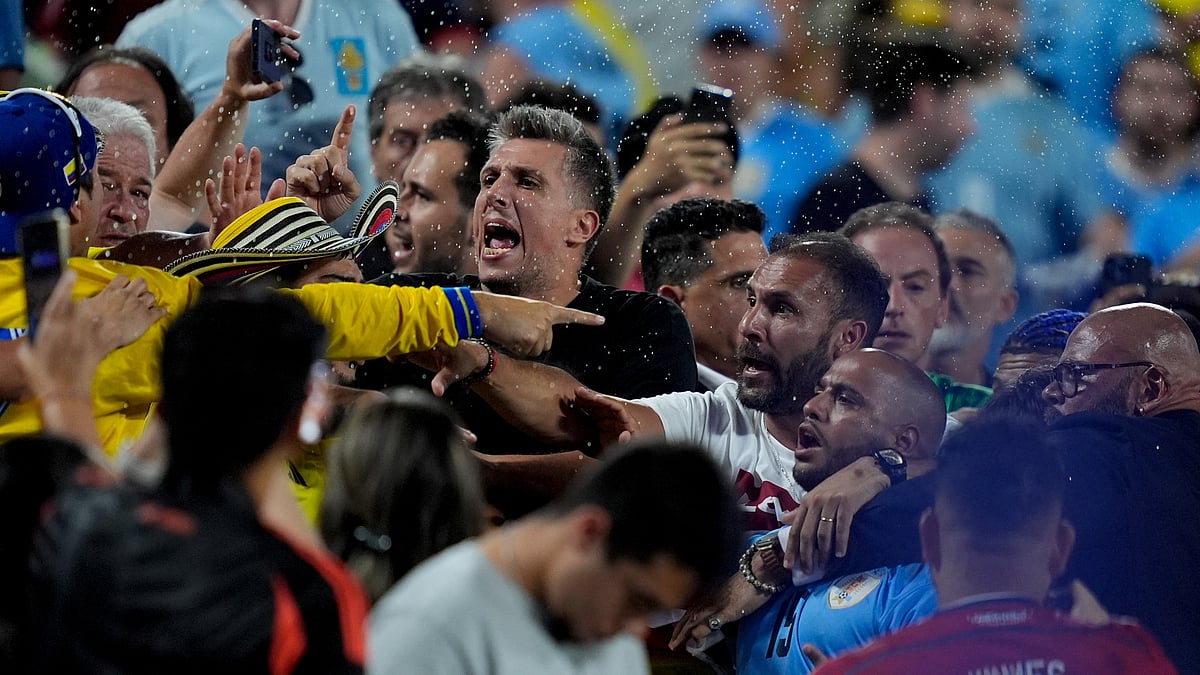 Uruguay's players argue with fans at the end of a Copa America semifinal soccer match against Colombia in Charlotte, N.C., Wednesday, July 10, 2024. 
 - (AP Photo/Julia Nikhinson)
